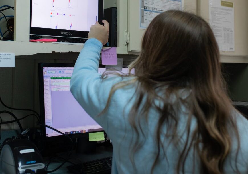 Girl Pointing At Computer